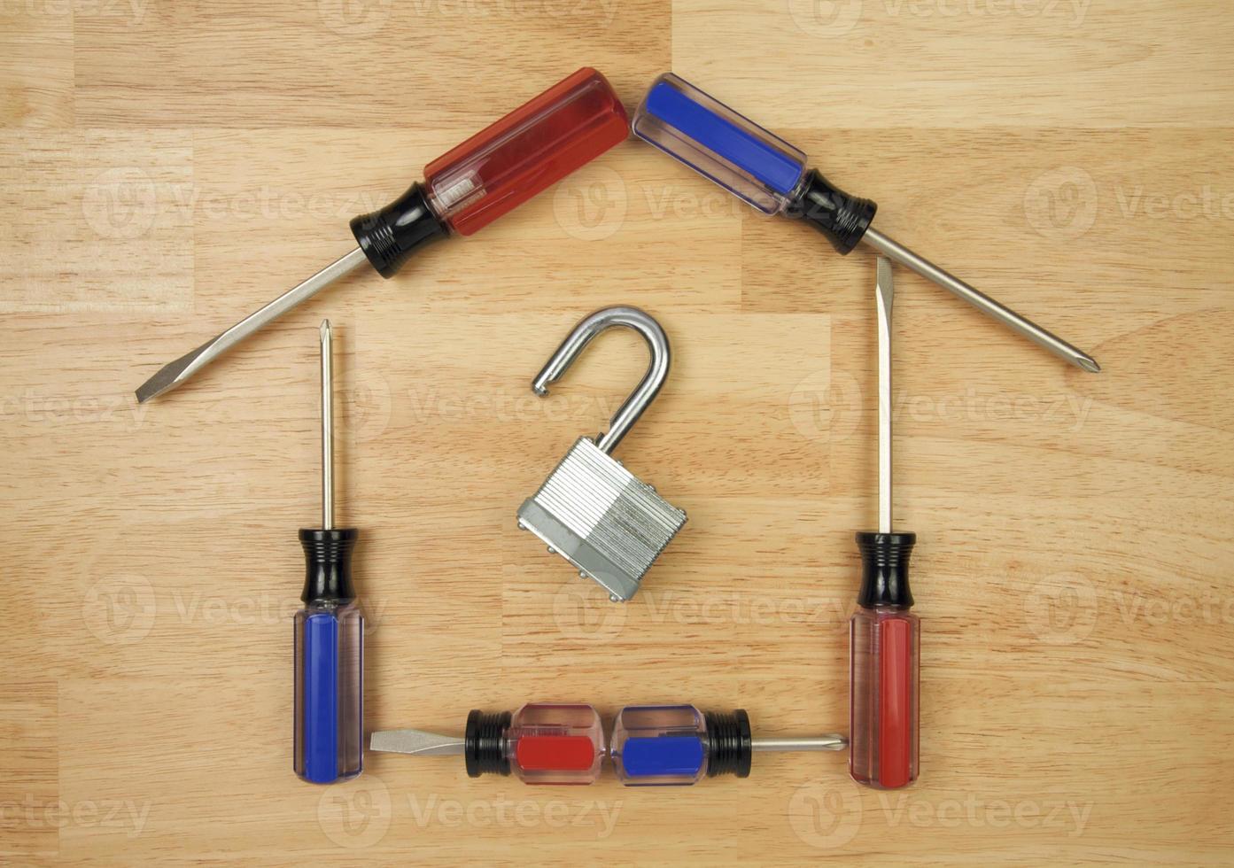House Shaped by Screwdrivers and Lock photo