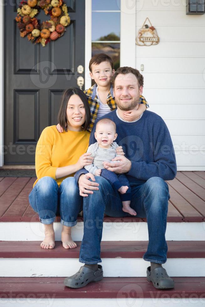 Young Mixed Race Chinese and Caucasian Family Portrait photo