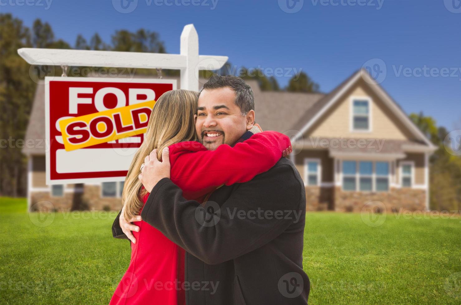 Mixed Race Couple, House, Sold Real Estate Sign photo