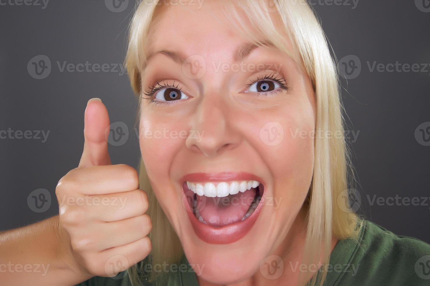 Beautiful Woman with a Thumbs Up photo