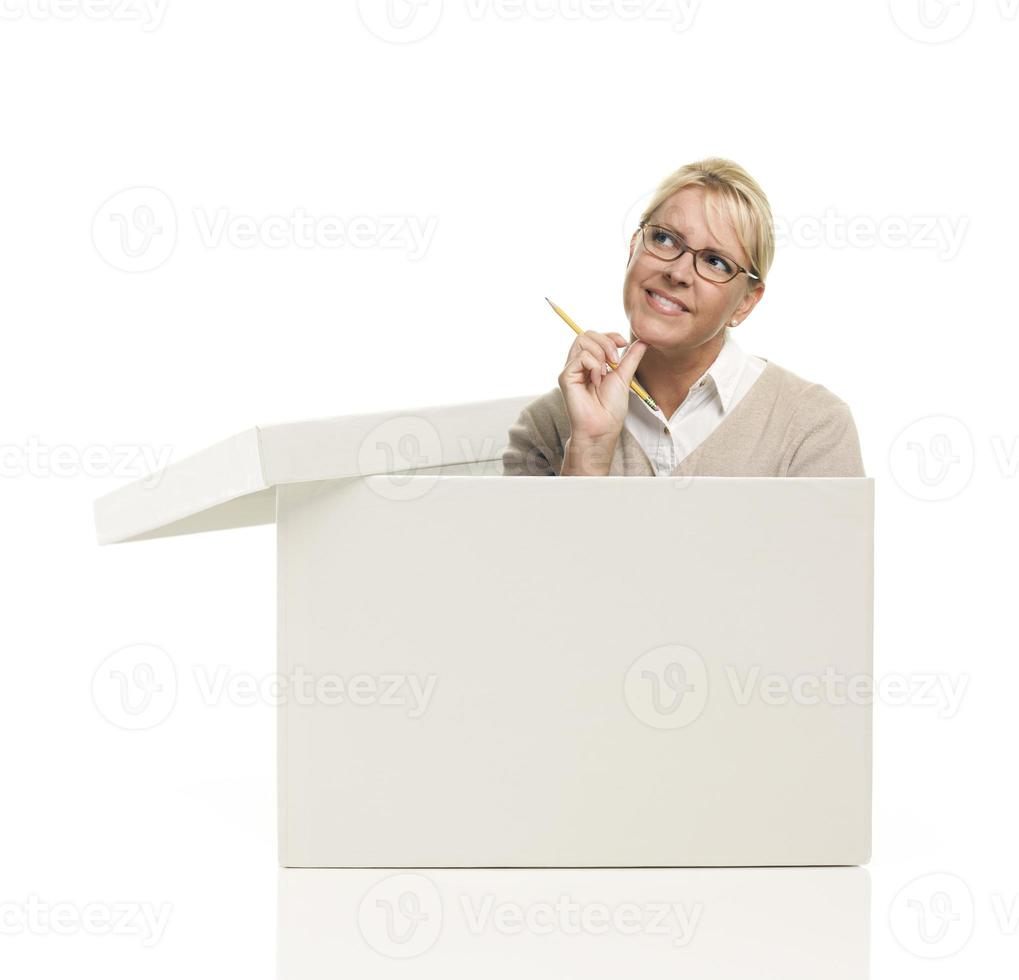 Pretty Female Popping Out and Thinking Outside The Box photo