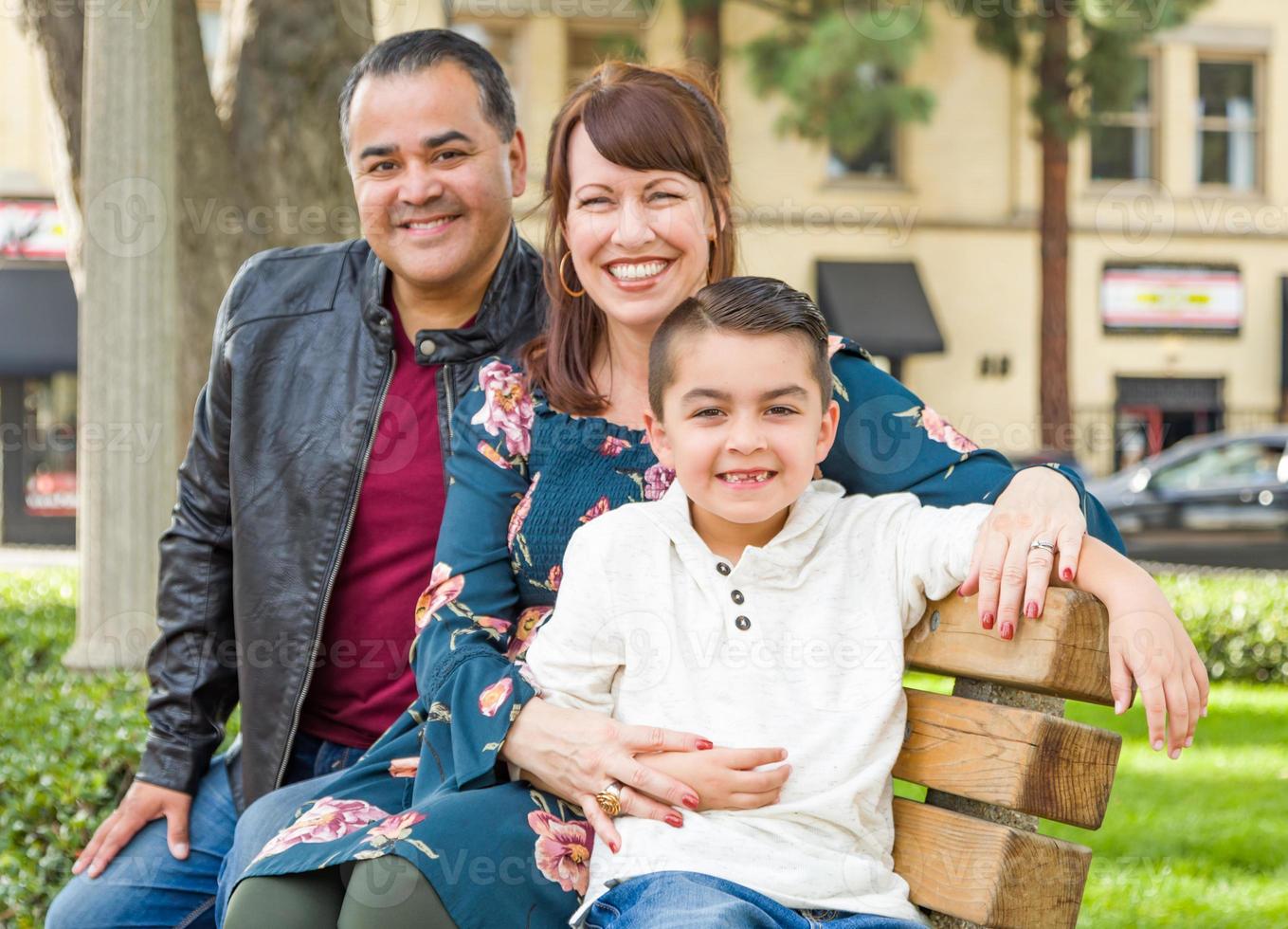 Mixed Race Young Family Portrait At The Park photo