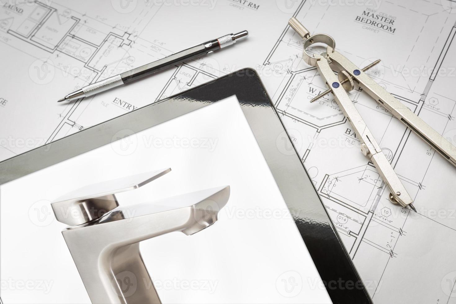 Computer Tablet Showing Custom Faucet On House Plans, Pencil, Compass photo