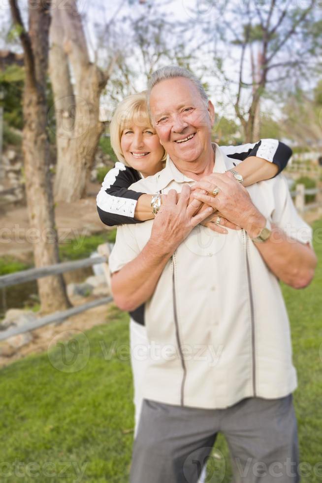 Affectionate Senior Couple Portrait At The Park photo