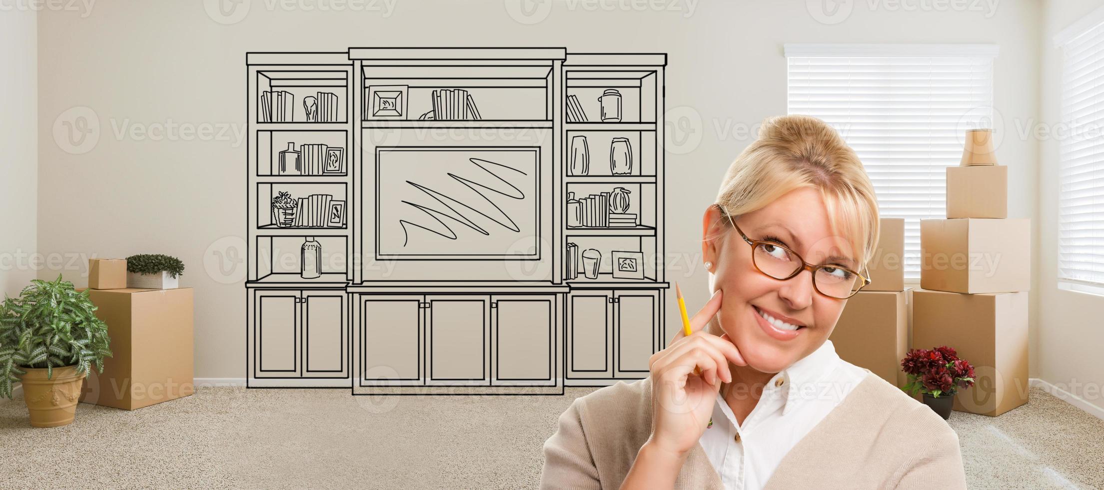 Woman Inside Room With Moving Boxes Glancing Toward Entertainment Unit Drawing on Wall photo
