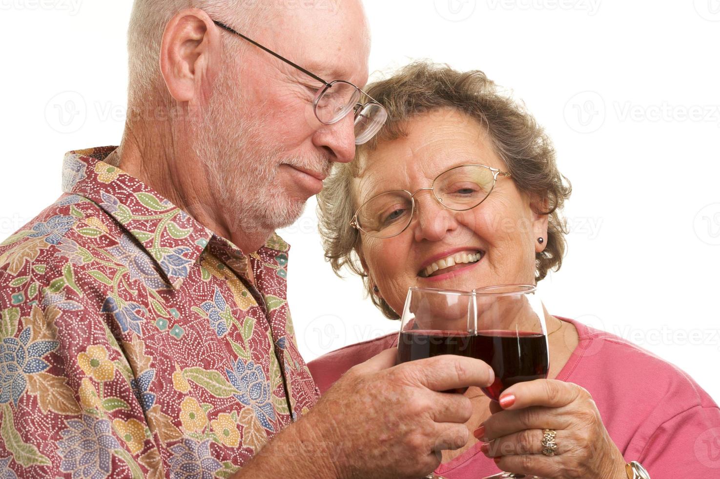 Happy Senior Couple Toasting photo