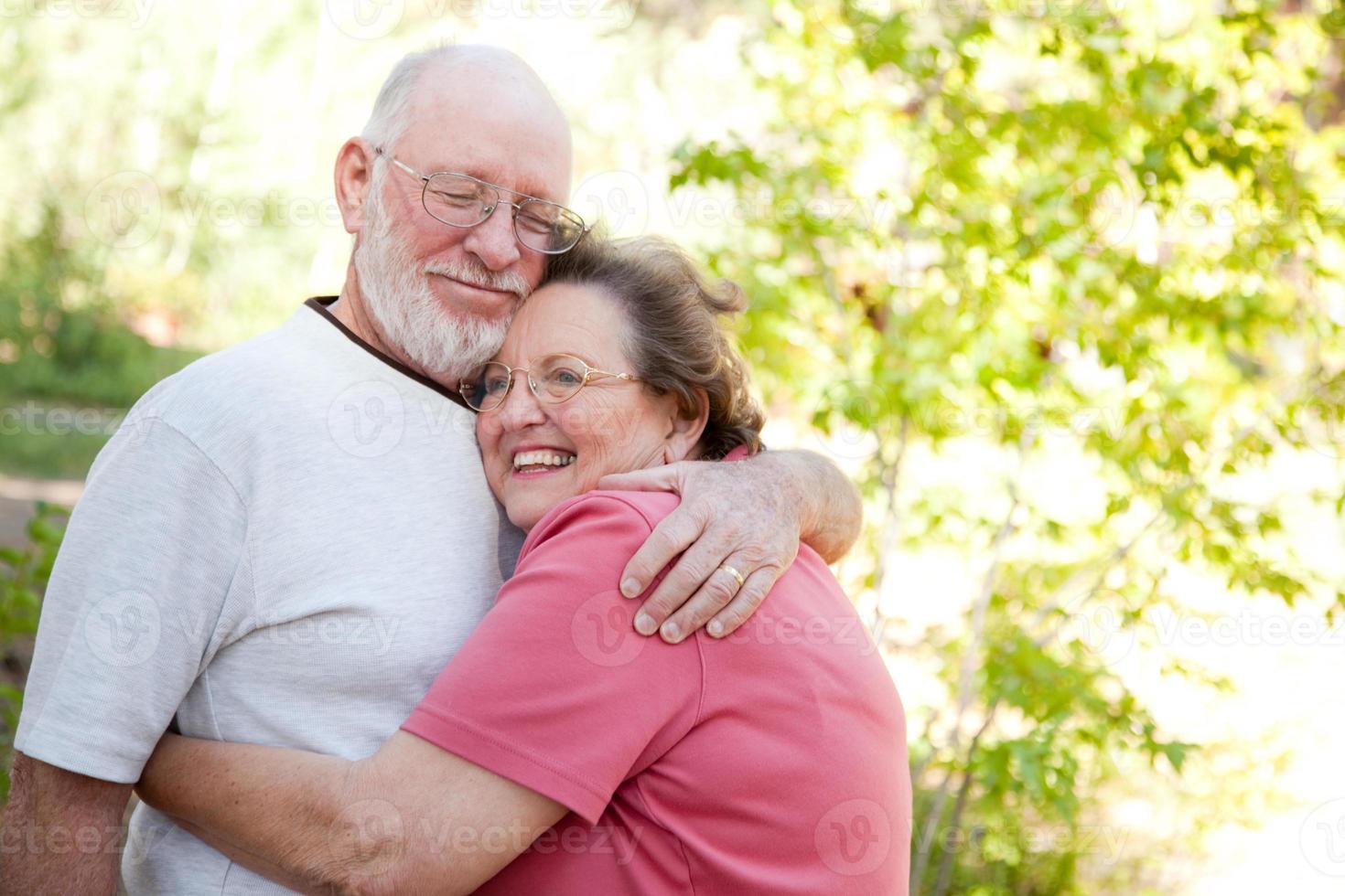 Loving Senior Couple Outdoors photo