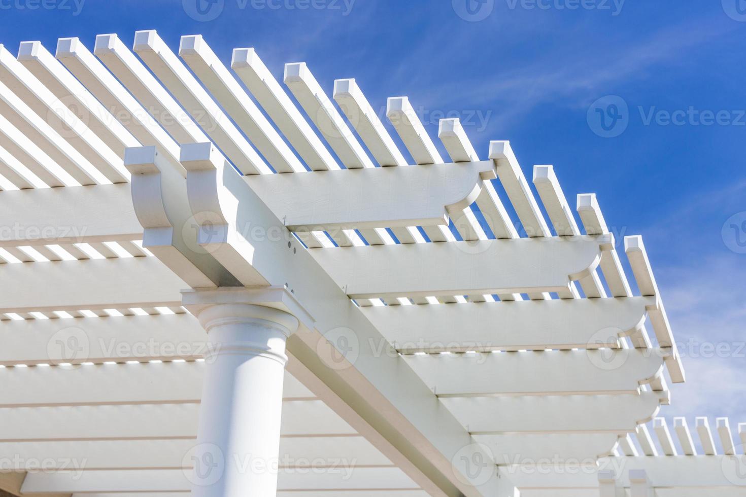 Beautiful House Patio Cover Against the Blue Sky. photo