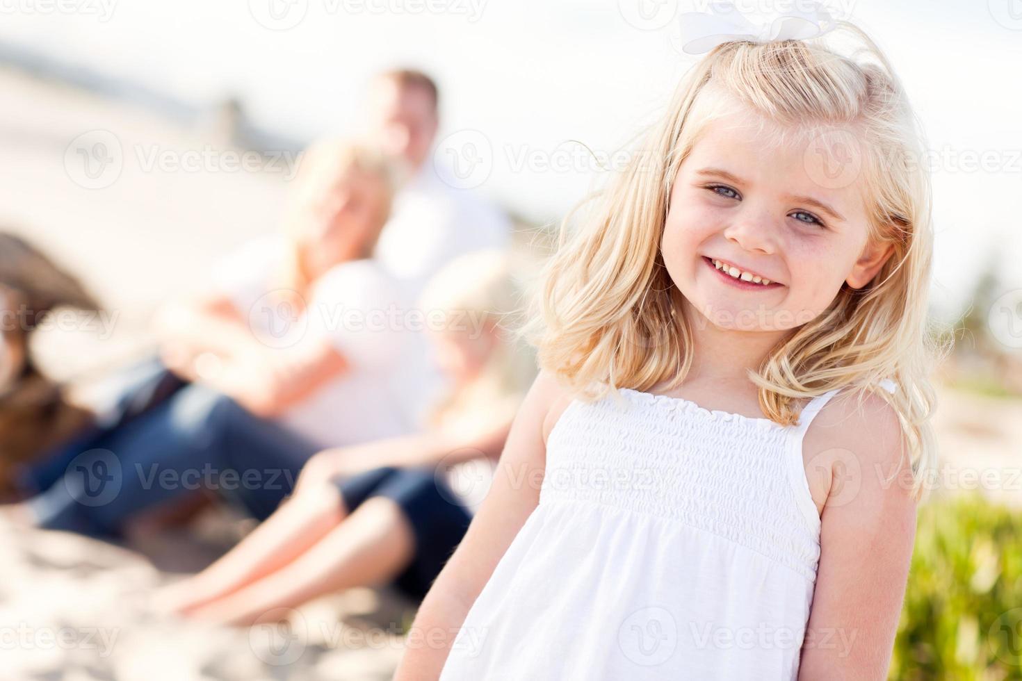 Adorable Little Blonde Girl Having Fun At the Beach photo