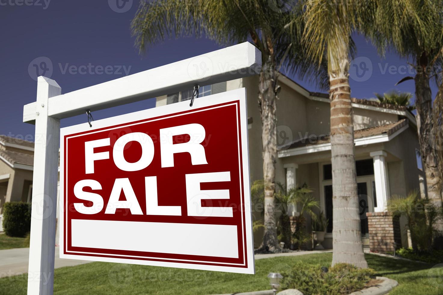 For Sale Real Estate Sign and House photo