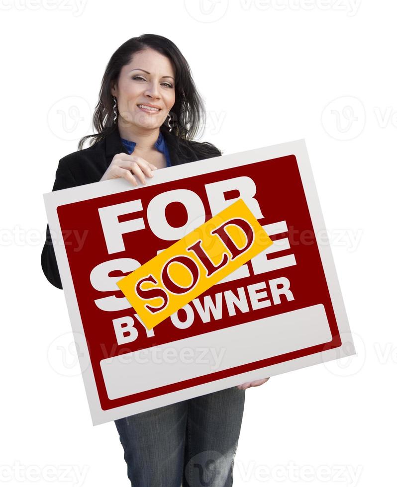 Hispanic Woman Holding Sold For Sale By Owner Sign photo