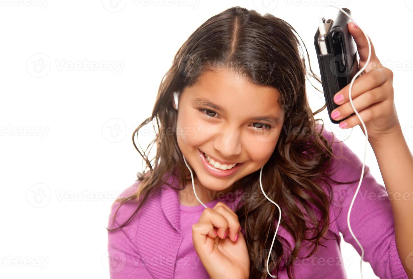 Pretty Hispanic Girl Listening and Dancing to Music photo