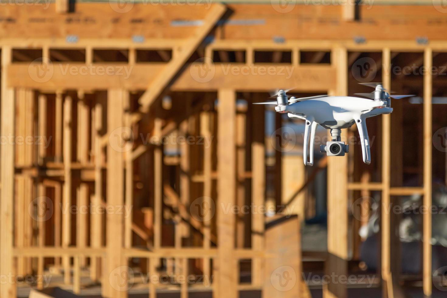 Drone Quadcopter Flying and Inspecting Construction Site photo