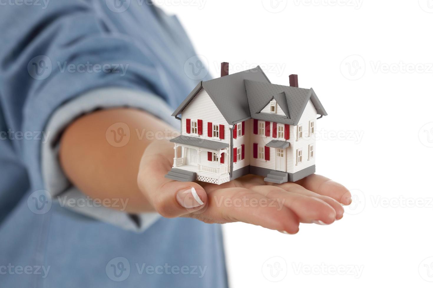 House in Female Hand on White photo