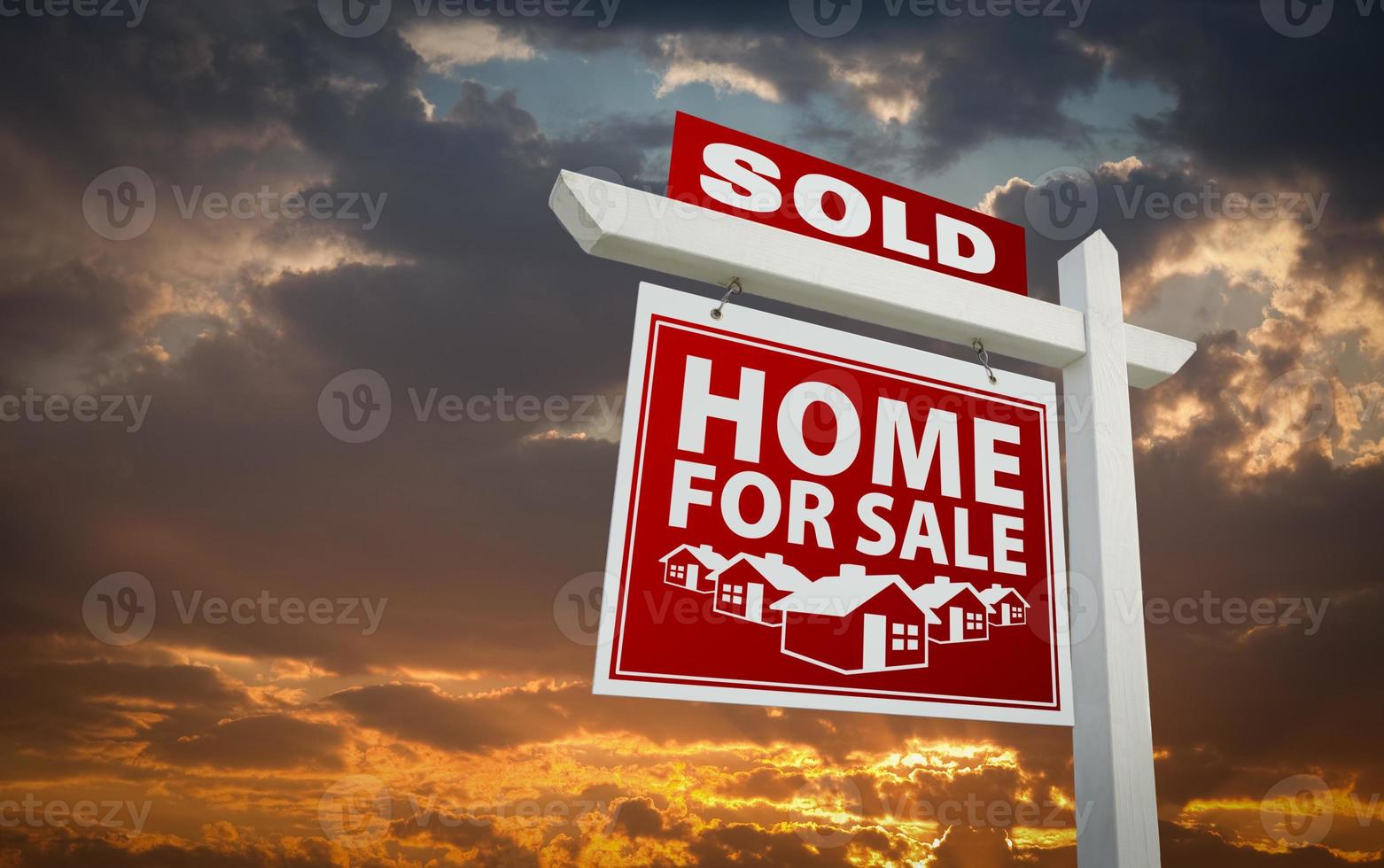 Red Sold Home For Sale Real Estate Sign Over Sunset Sky photo