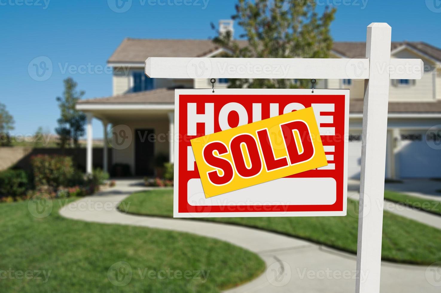 Sold Home for Sale Real Estate Sign and House photo