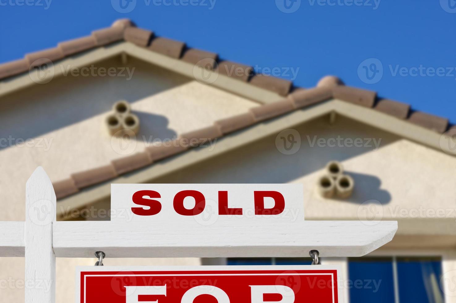 Sold Home For Sale Real Estate Sign and House photo