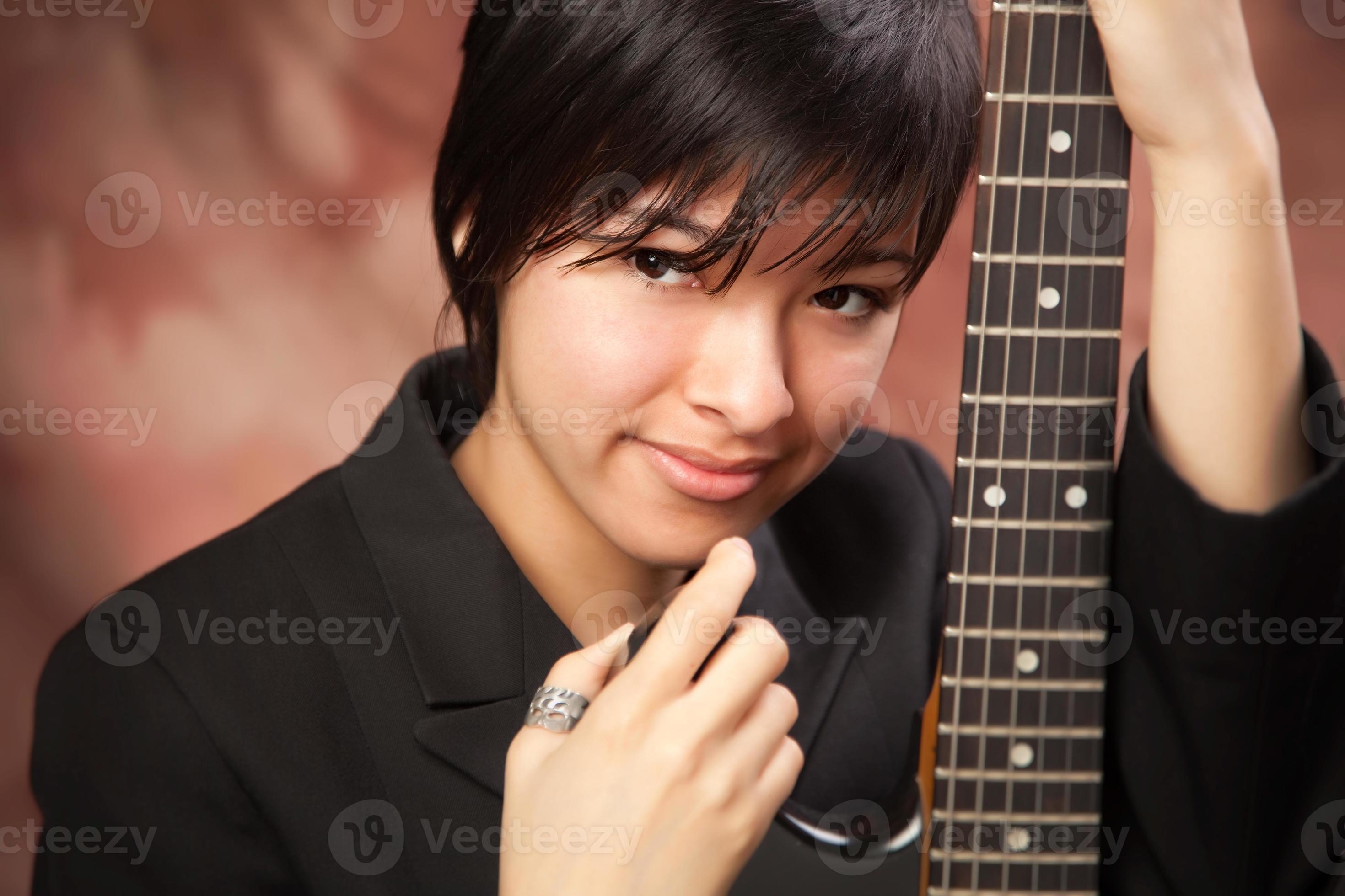 Cool Pose Of A Young Man Playing Electric Guitar Isolated On White  Background Stock Photo, Picture and Royalty Free Image. Image 40239981.