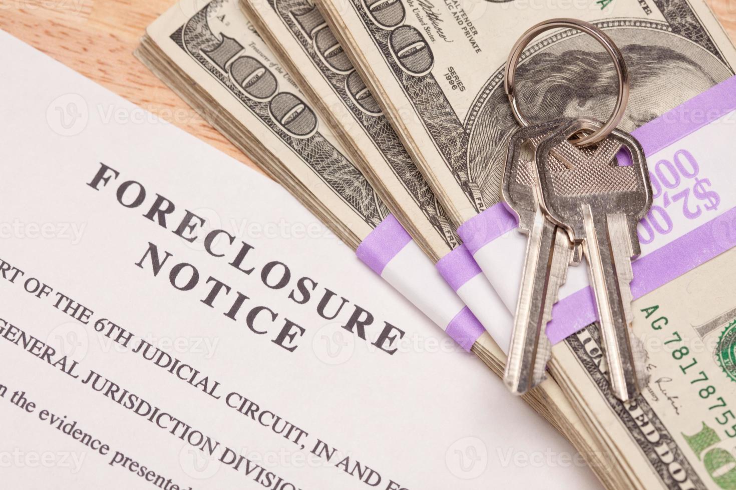 House Keys, Stack of Money and Foreclosure Notice photo