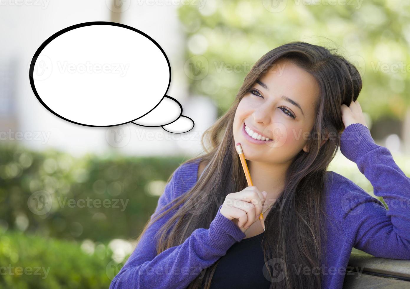 Pensive Woman with Blank Thought Bubble Beside Her photo