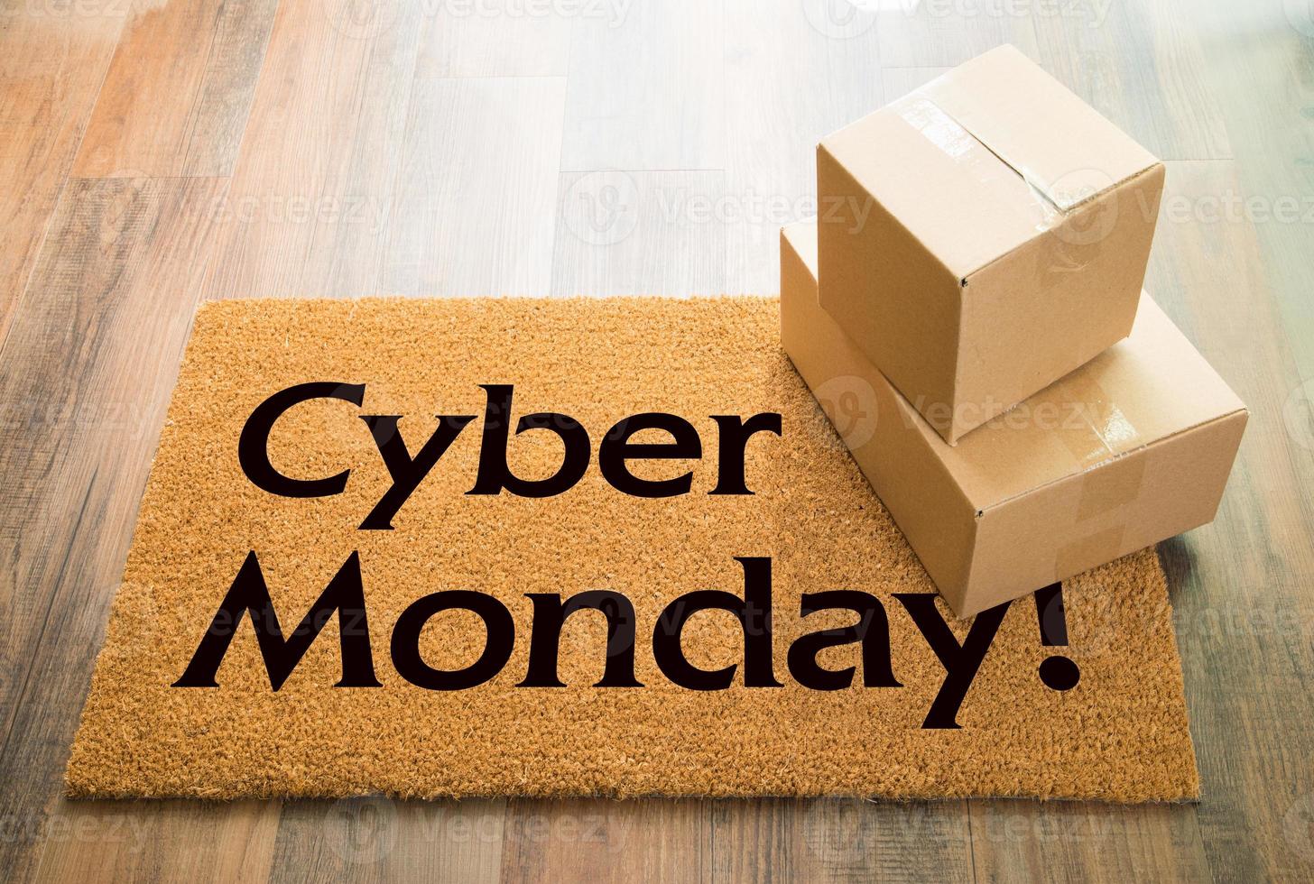Cyber Monday Welcome Mat On Wood Floor With Shipment of Boxes photo