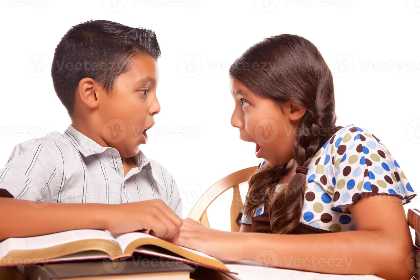 Hispanic Brother and Sister Having Fun Studying photo