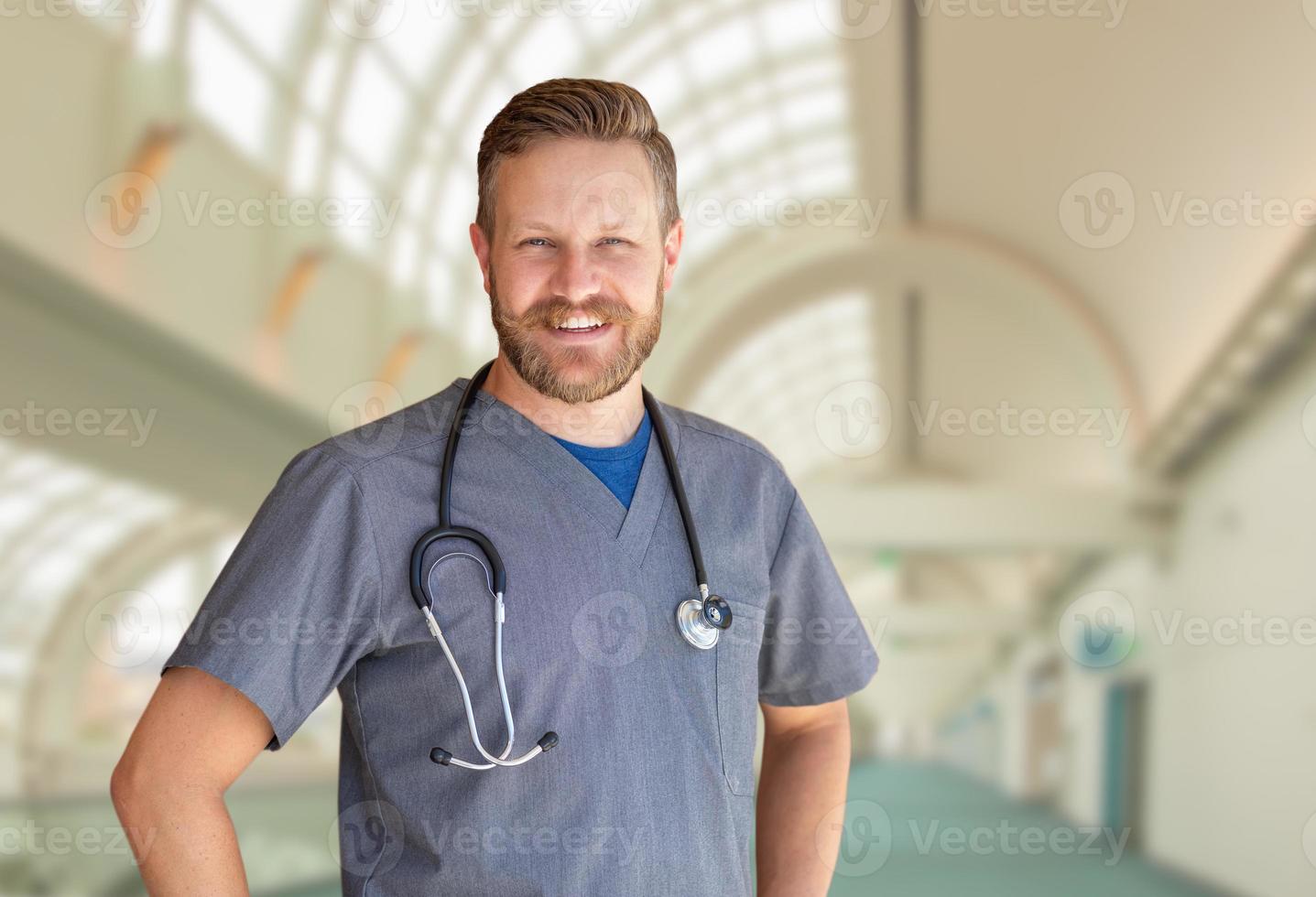 Caucasian Male Nurse Inside Hospital Building photo