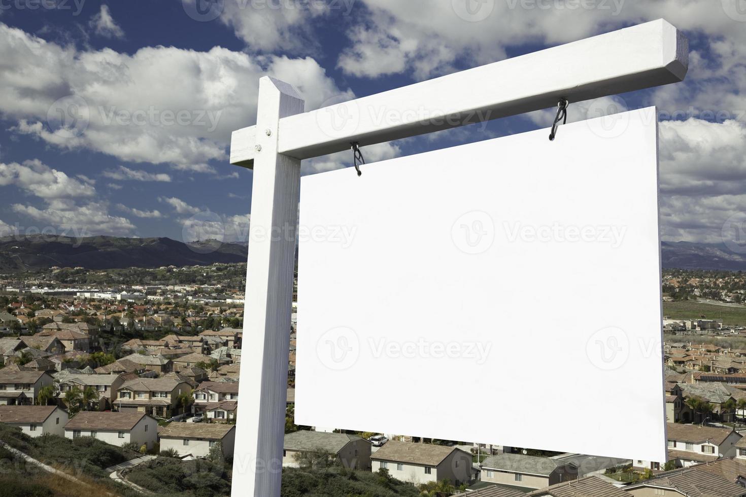 Blank Real Estate Sign Over Elevated Housing Community View photo