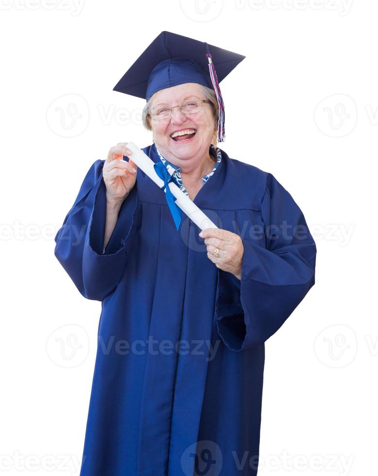 Happy Senior Adult Woman Graduate In Cap and Gown Holding Diploma Isolated on a White Background. photo