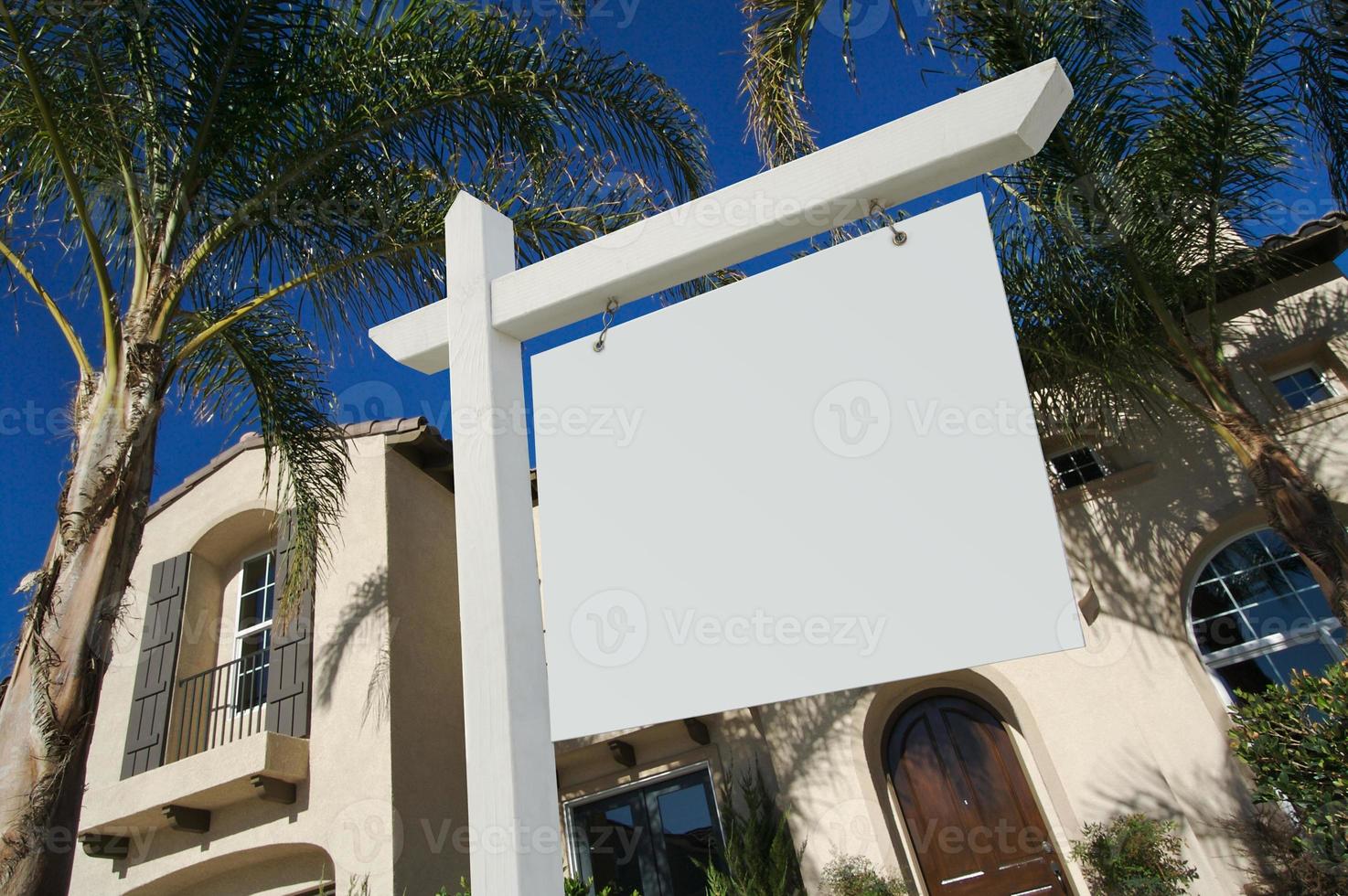 Blank Real Estate Sign and New Home photo