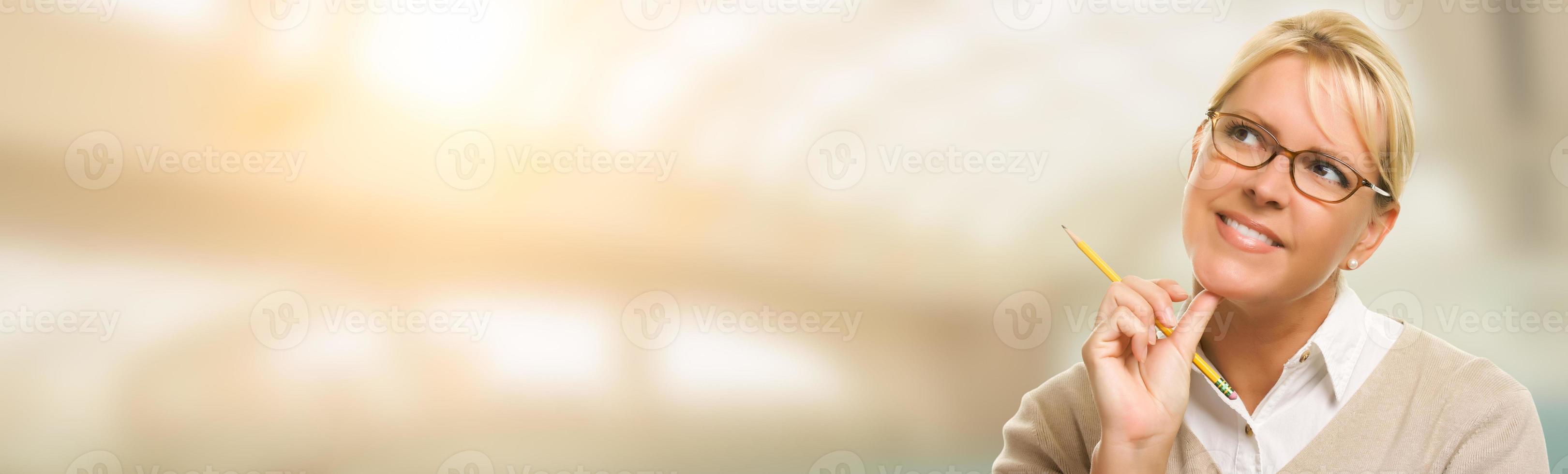 Contemplative Young Adult Woman Looking Off To The Side Wide Banner with Room For Text. photo