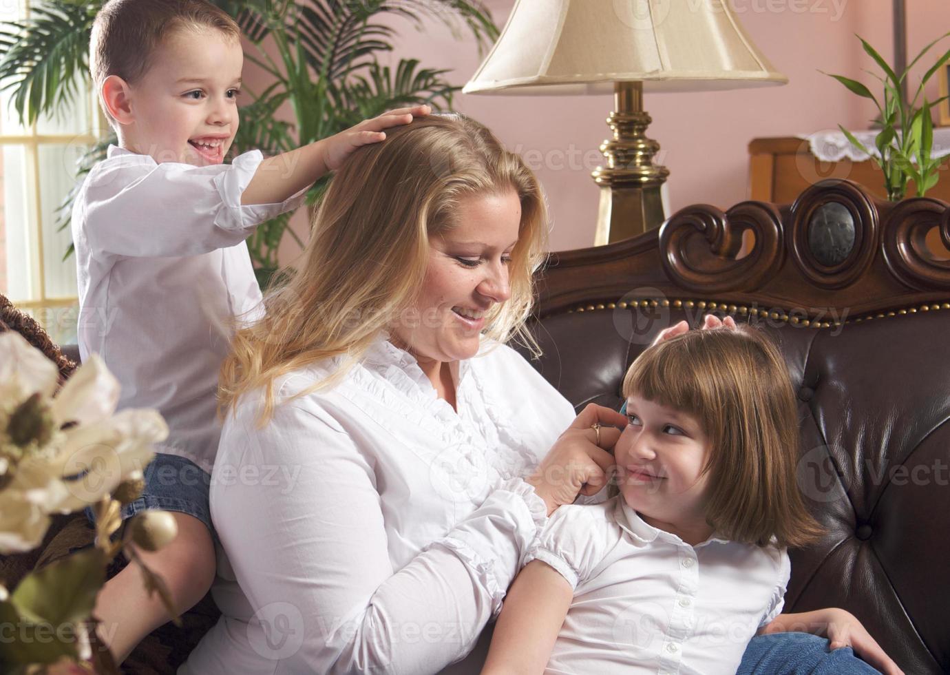 Mother and Children on The Couch photo