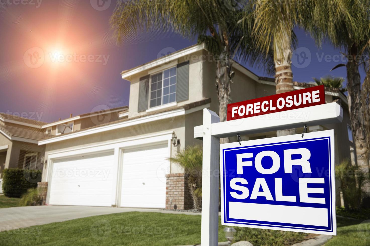 Red Foreclosure For Sale Real Estate Sign and House photo