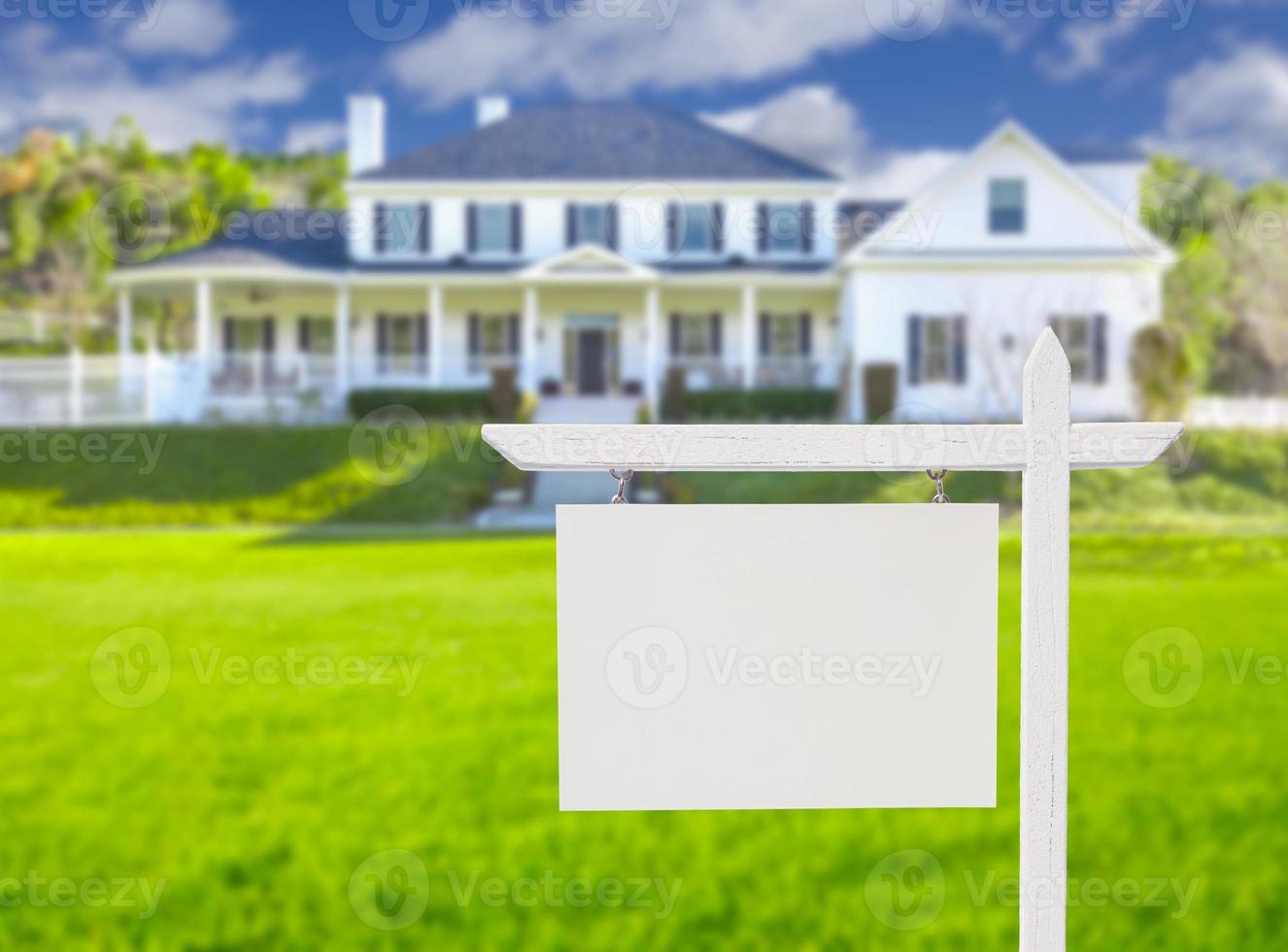 Blank Real Estate Sign in Front of New House photo