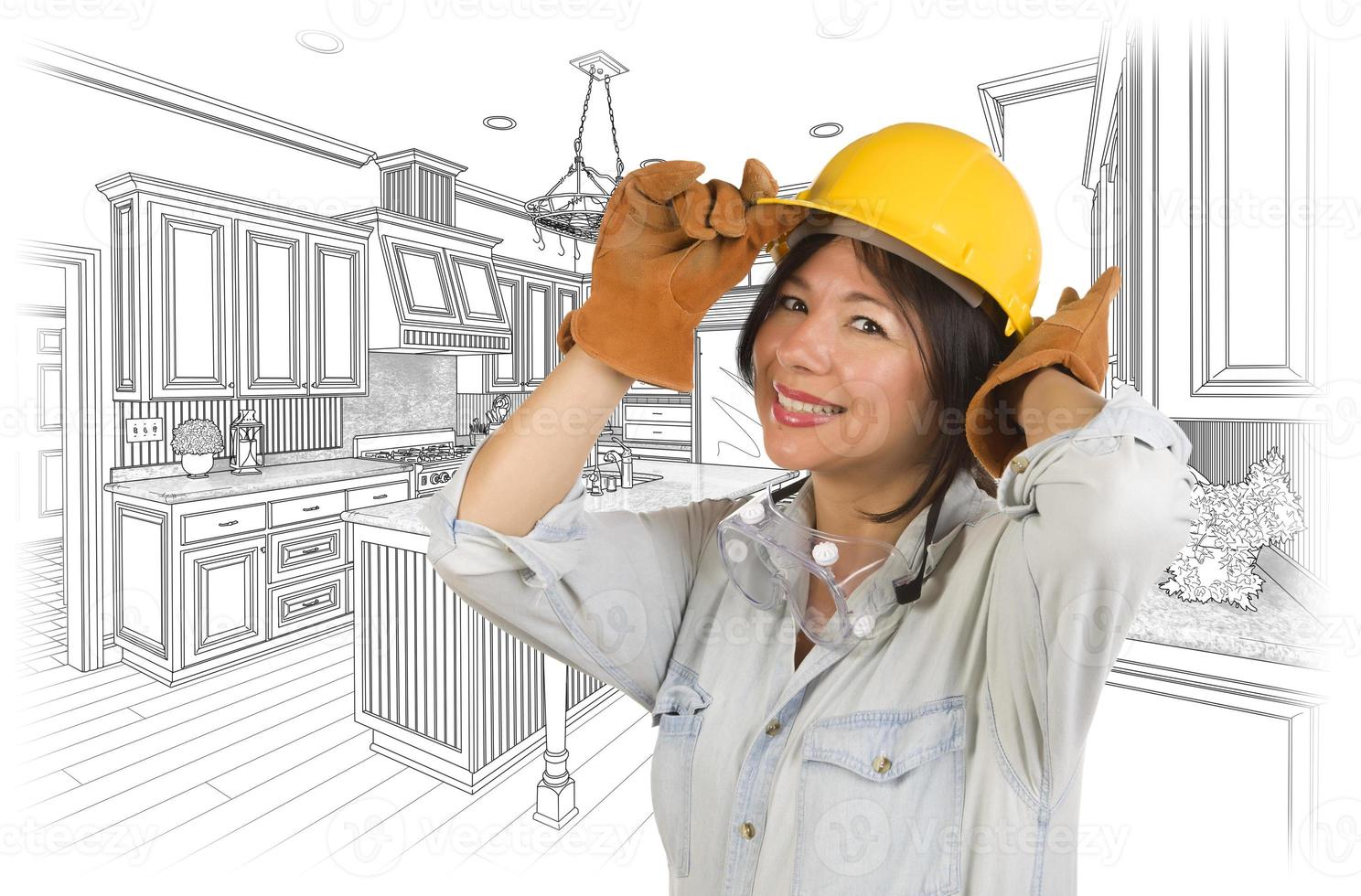 Hispanic Woman in Hard Hat with Kitchen Drawing Behind photo
