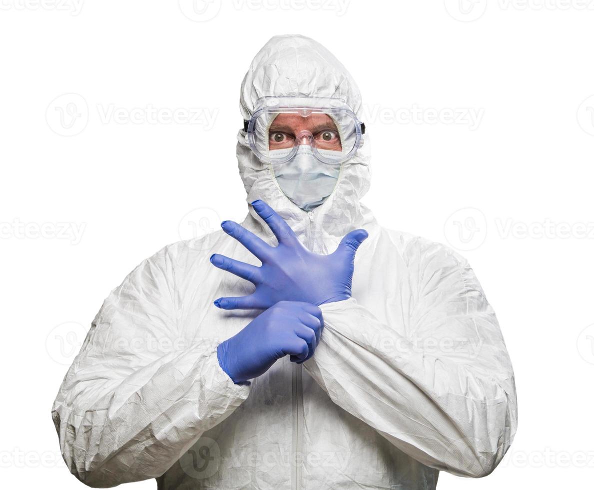 Man With Intense Expression Wearing HAZMAT Protective Clothing Isolated On A White Background. photo