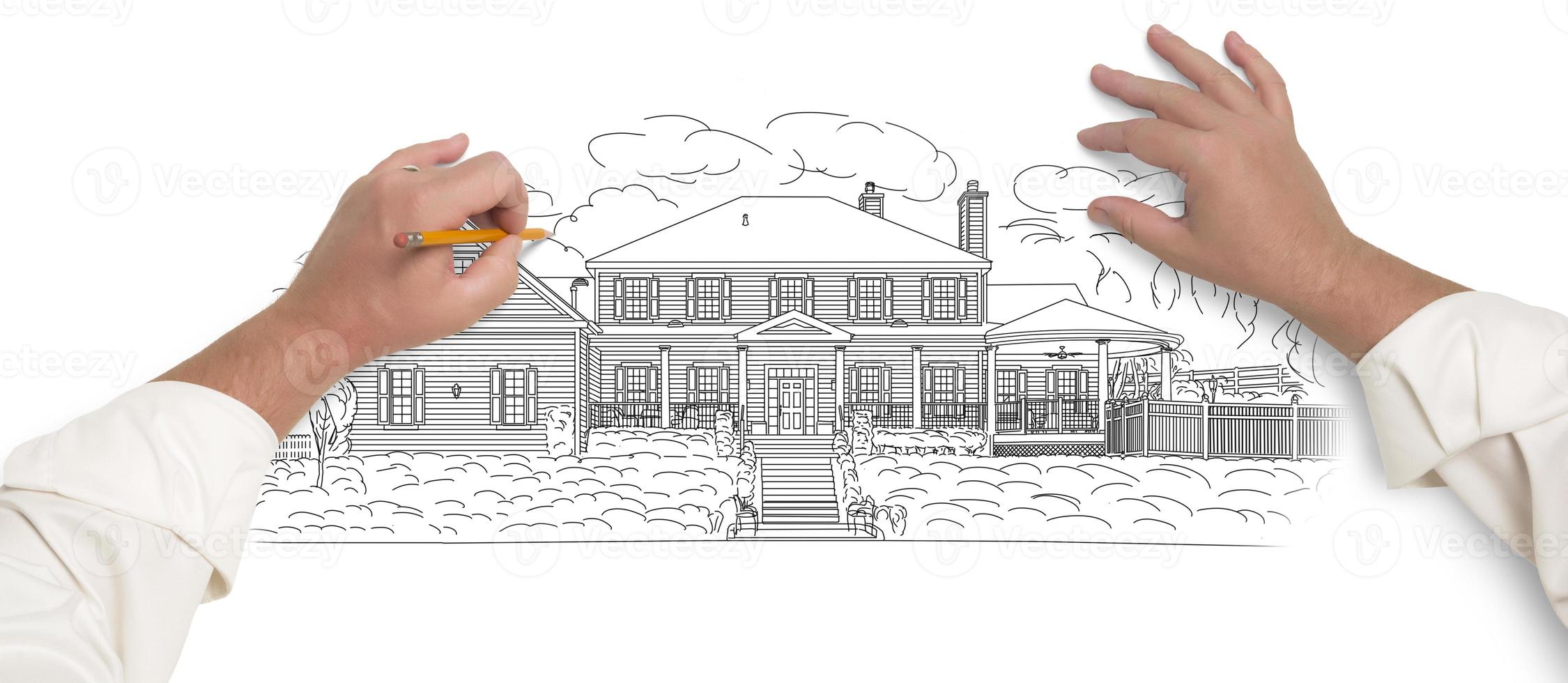 Male Hands Sketching A Beautiful House photo