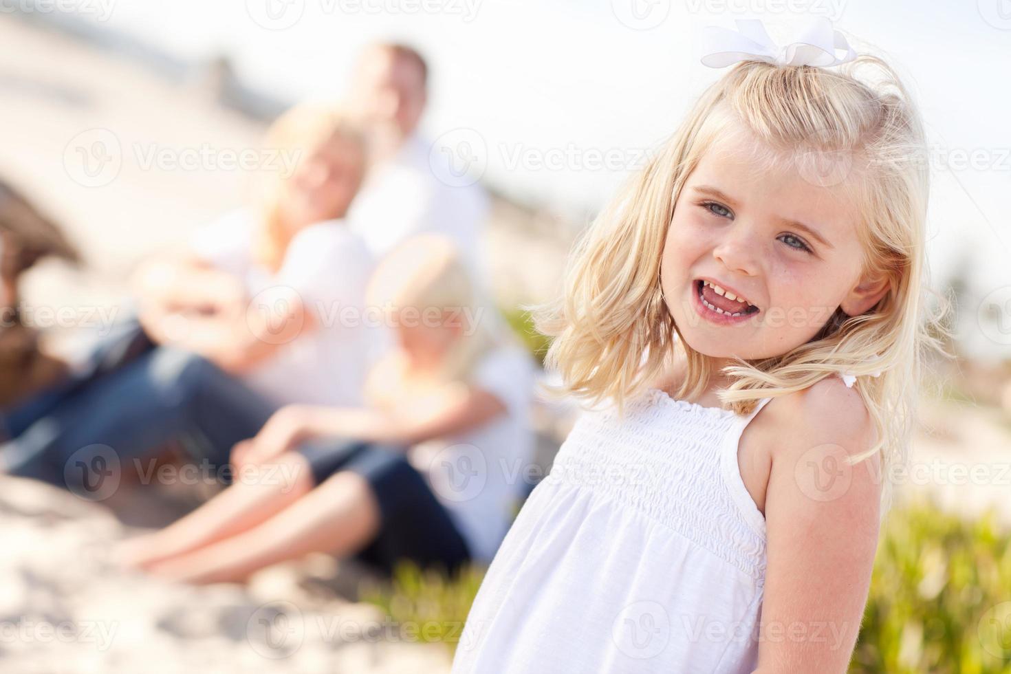 Adorable Little Blonde Girl Having Fun At the Beach photo