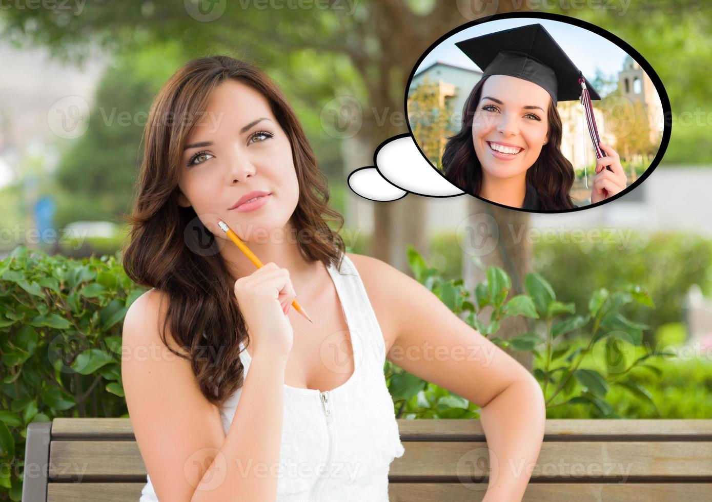 Thoughtful Young Woman with Herself as a Graduate Inside Thought Bubble. photo