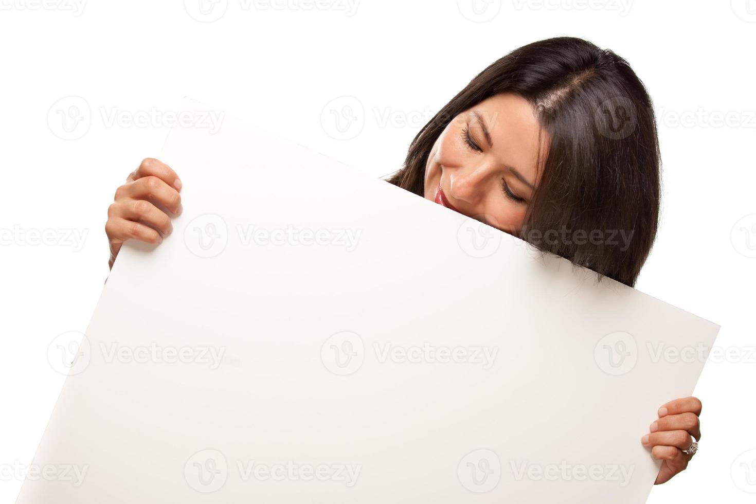 Attractive Multiethnic Woman Holding Blank White Sign photo