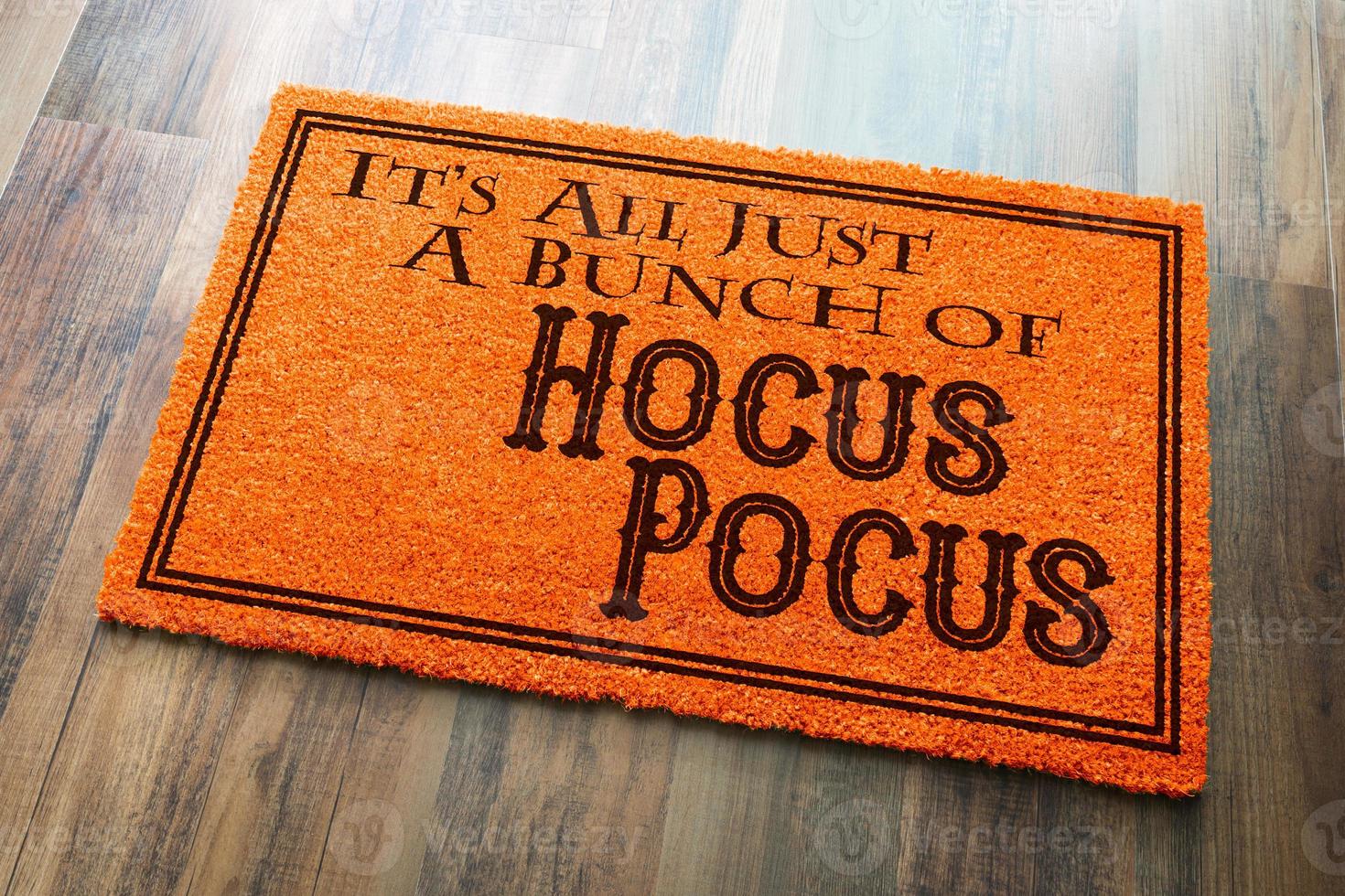 It's All A Bunch Of Hocus Pocus Halloween Orange Welcome Mat On Wood Floor Background photo