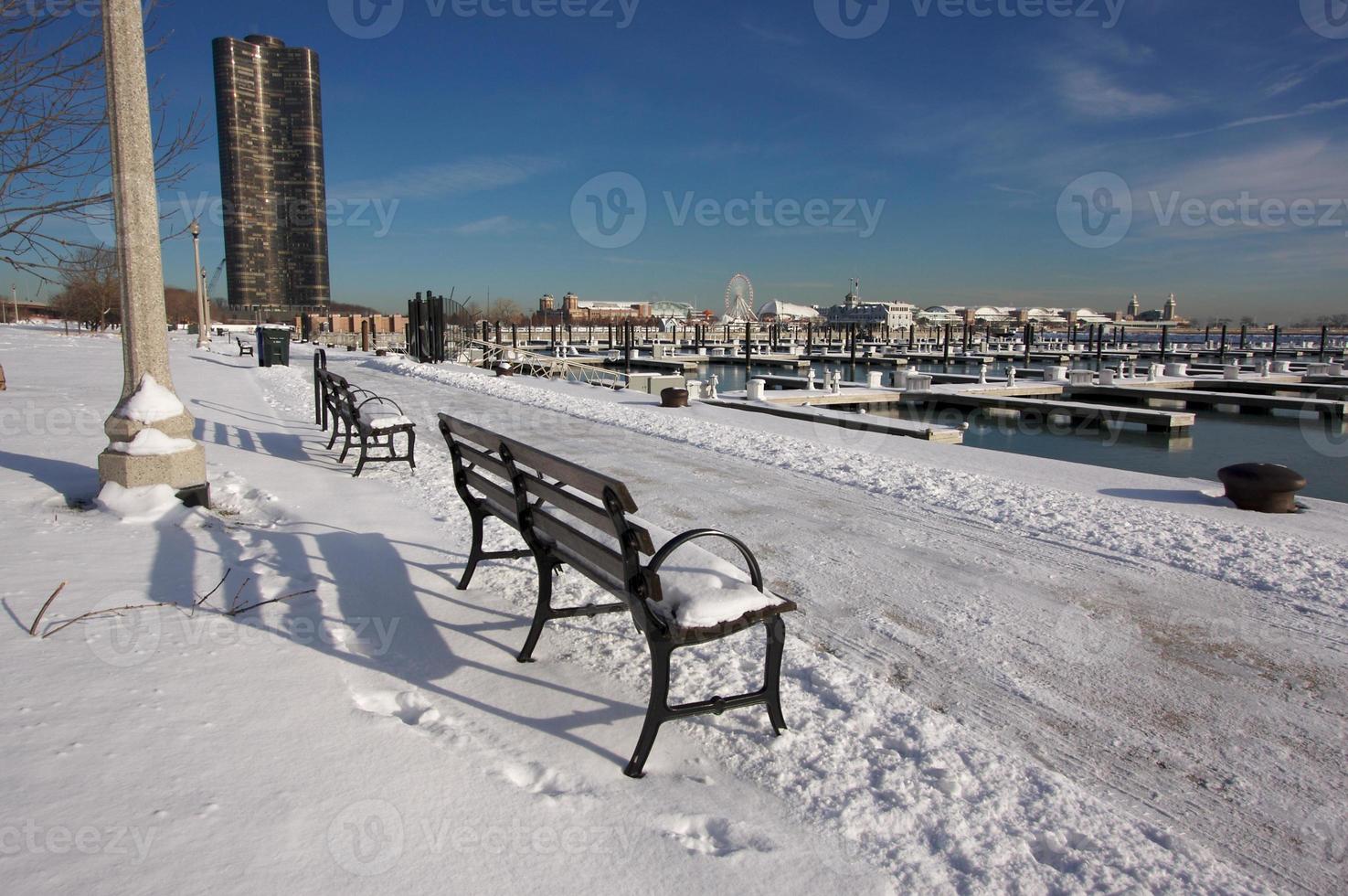 Empty Snowy Bench in Chicago photo