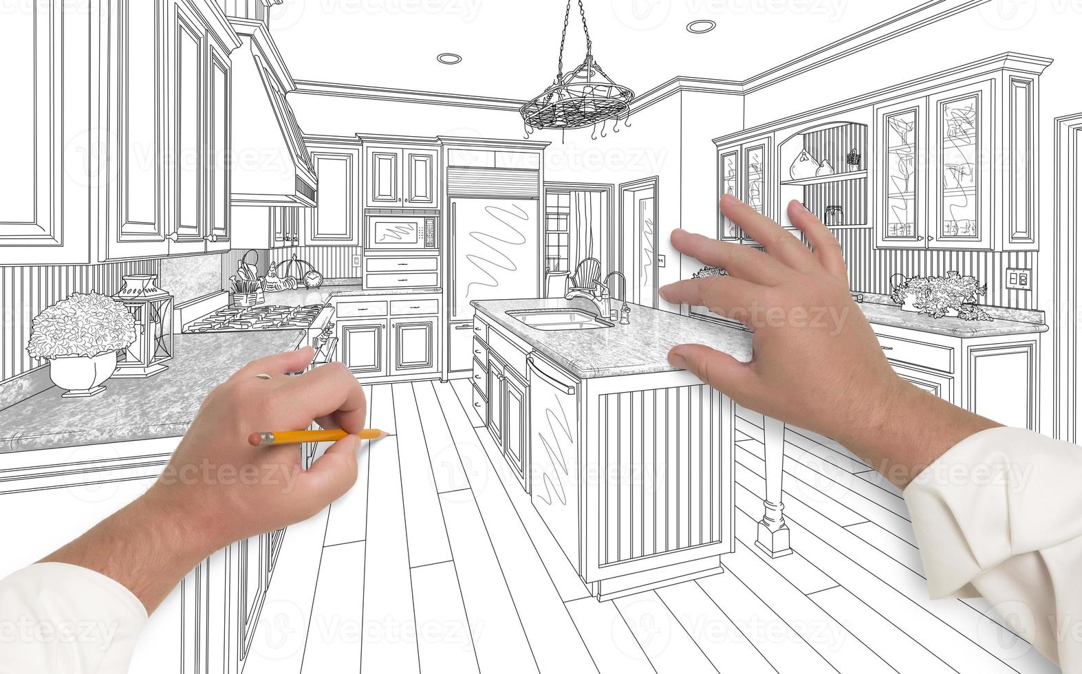Male Hands Sketching Beautiful Custom Kitchen photo