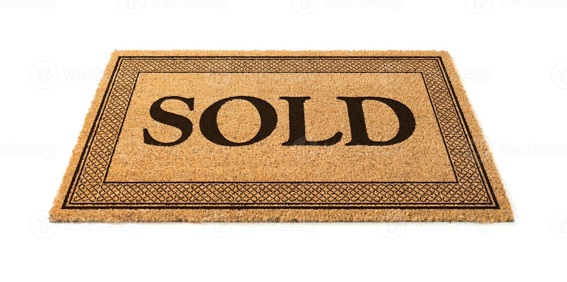 Sold Welcome Mat Isolated On A White Background photo