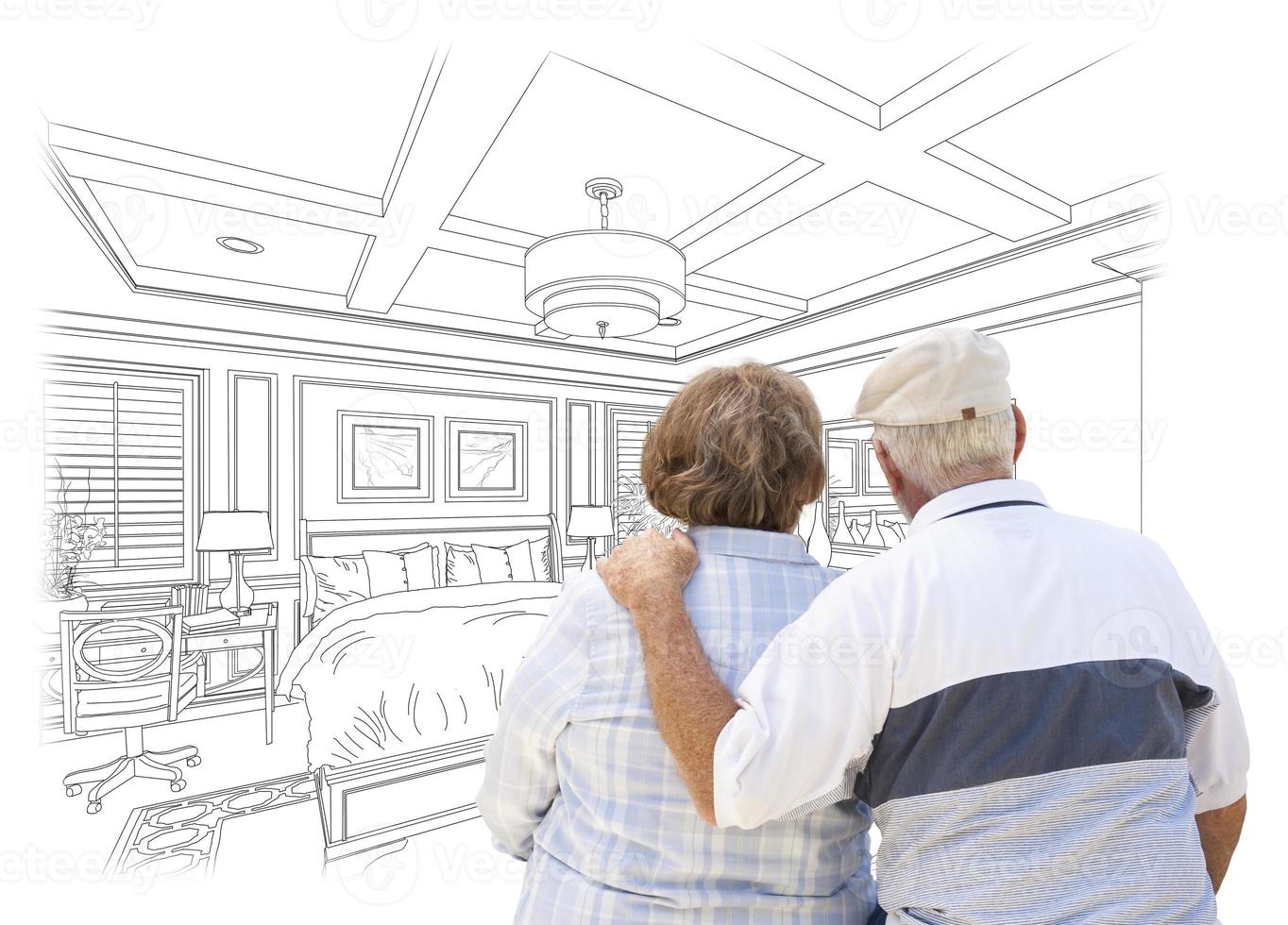 Senior Couple Looking Over Custom Bedroom Design Drawing photo