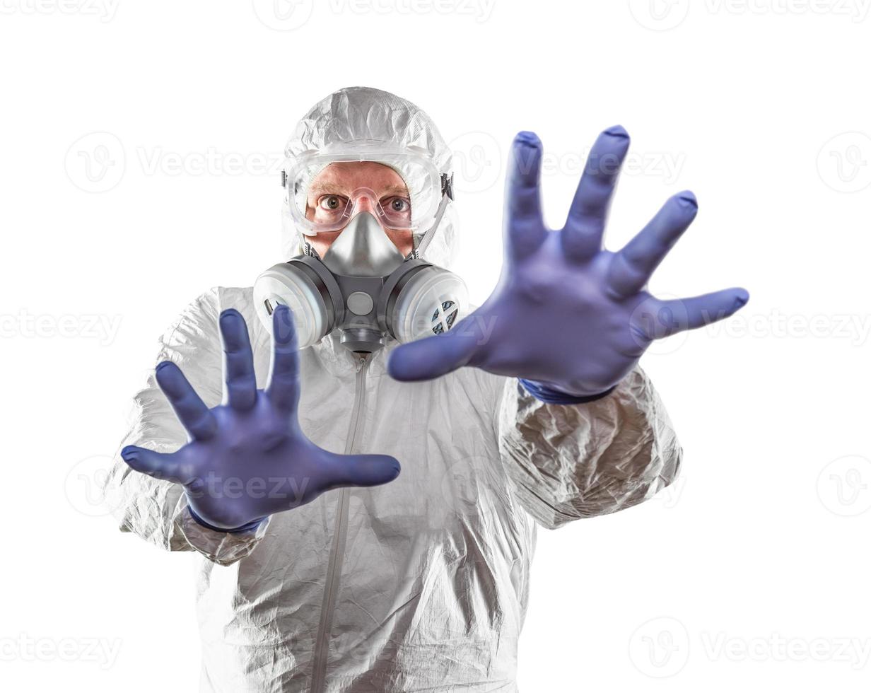 Man Wearing Hazmat Suit Reaching Out With Hands Isolated On White photo