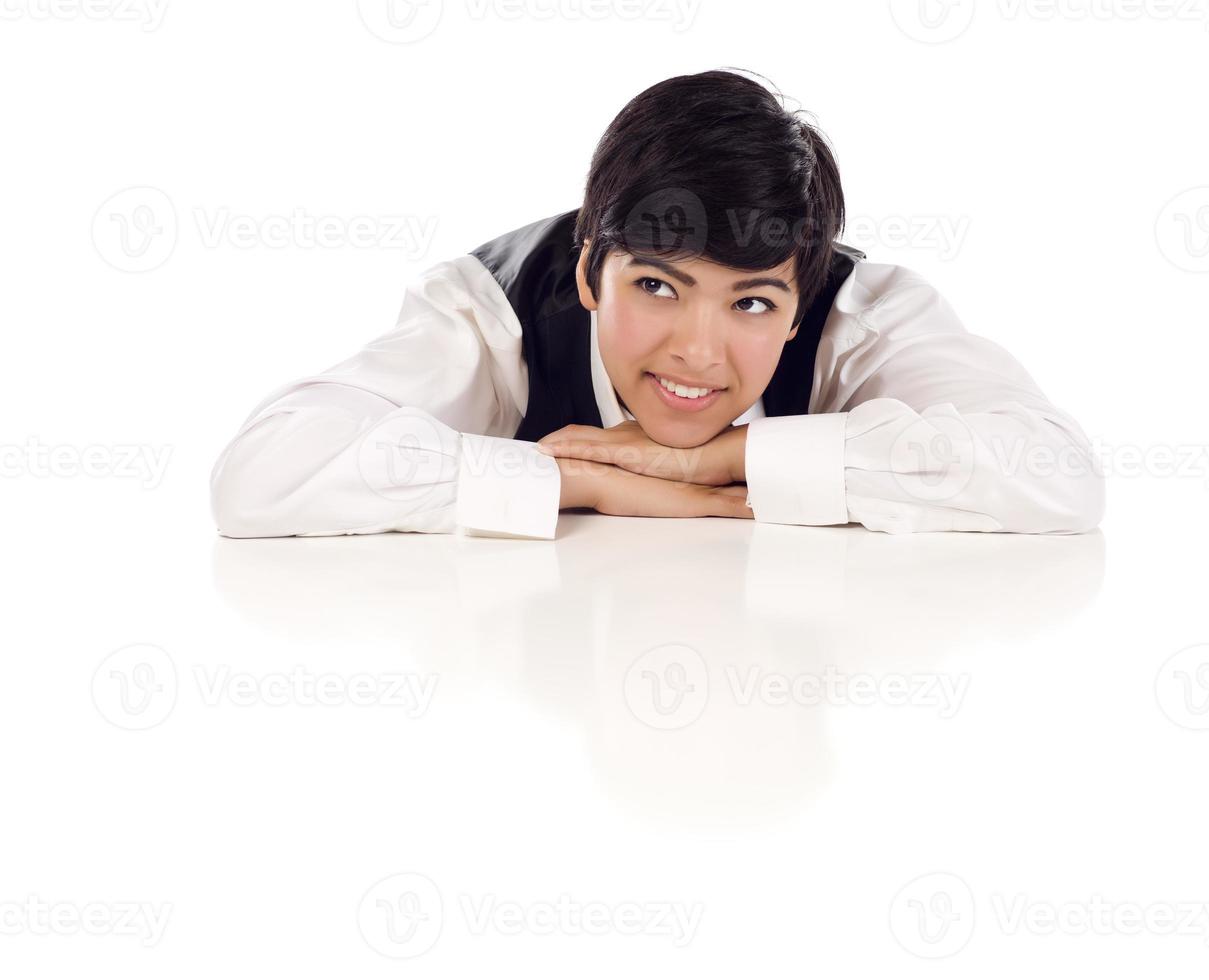 Mixed Race Female At Table Smiling Looking Up and Away photo