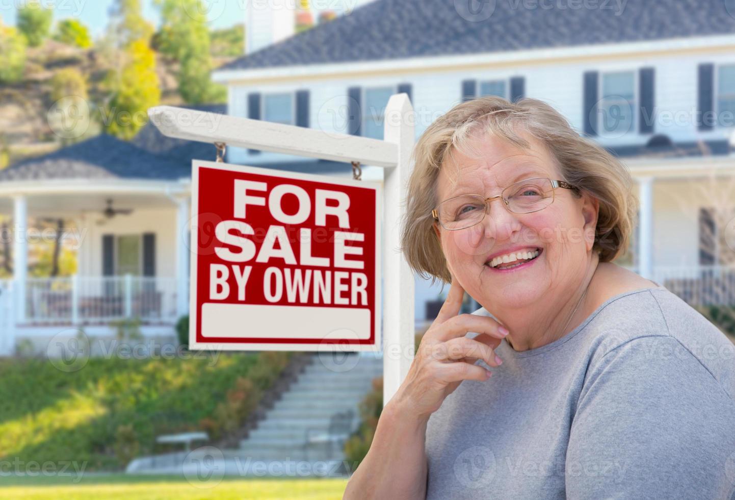 Senior Adult Woman in Front of Real Estate Sign, House photo