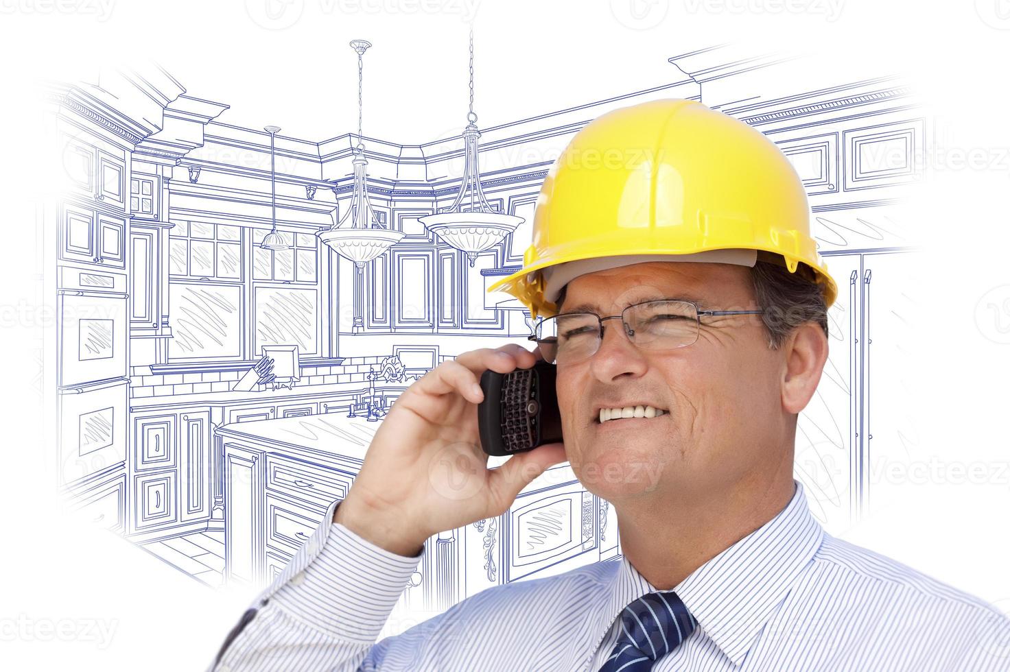 Contractor in Hardhat on Phone Over Custom Kitchen Drawing photo