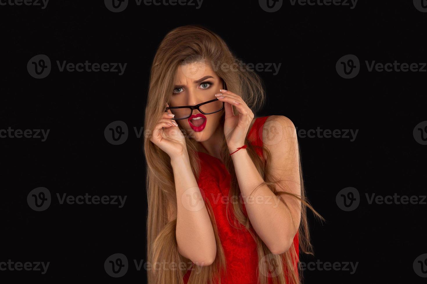 Woman in glasses is posing photo